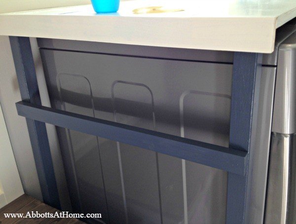 Build this DIY Laundry Table for just $85. This laundry table hides that ugly gap behind the machines, prevents things from falling behind the machines, and gives you a pretty place to fold that laundry.