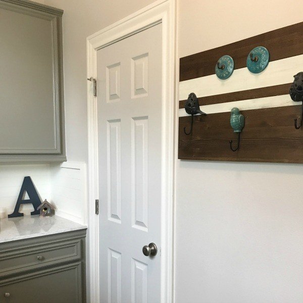 The 5 easy, low cost Powder Room Makeover Ideas that turned this bathroom from blah to full of beautiful farmhouse style. 5 steps to give your powder room or small bathroom a fresh new look on a budget.