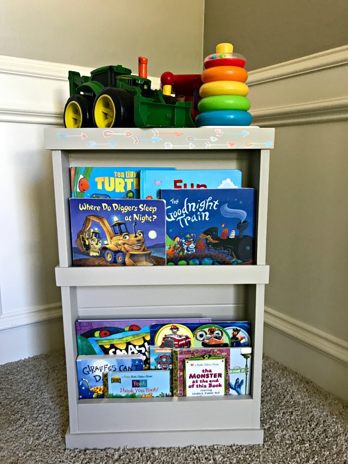 Build this DIY Hidden Toy Storage. Adding furniture sliders or casters to this cute storage hides the messy toys in the back, while your kids cute books are displayed on the front.