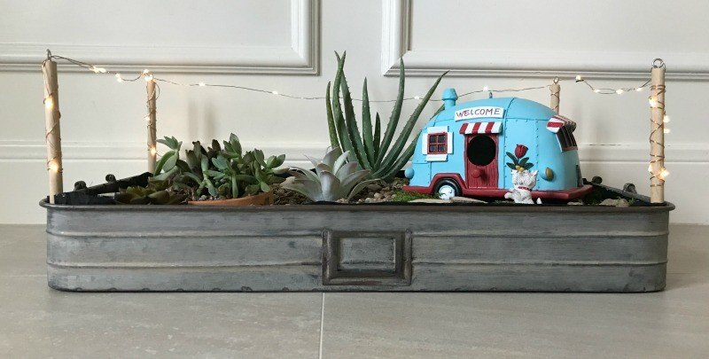This LED Lighted DIY Indoor Succulent Garden Tray is one of the easiest DIY Succulent Garden Ideas you'll find. Fill with your favorite succulents and vintage truck or camper to give it some extra charm. You have to love Easy Indoor Succulents, especially when they're cute decor.