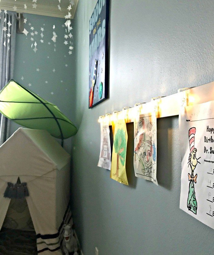 Quick and Easy DIY Light Clip Display Board. Fun way to display kid's art, photos, notes, and more.