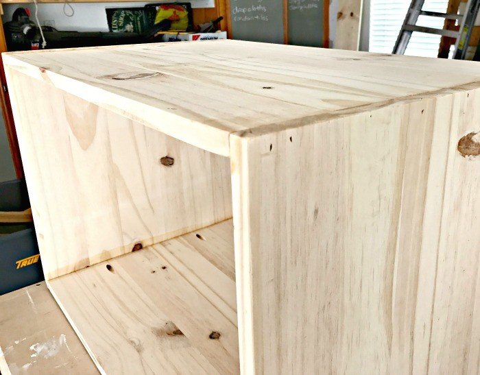 The sides of the box have been glued and nailed together. Build a Modern Farmhouse DIY Wooden Toy Storage Crate or Box for all of those kids toys cluttering up your house. Makes a beautiful throw pillow and blanket box in a Living Room or catch all storage box for teens too! #AbbottsAtHome #StorageBox #ToyBox #DIYStorage