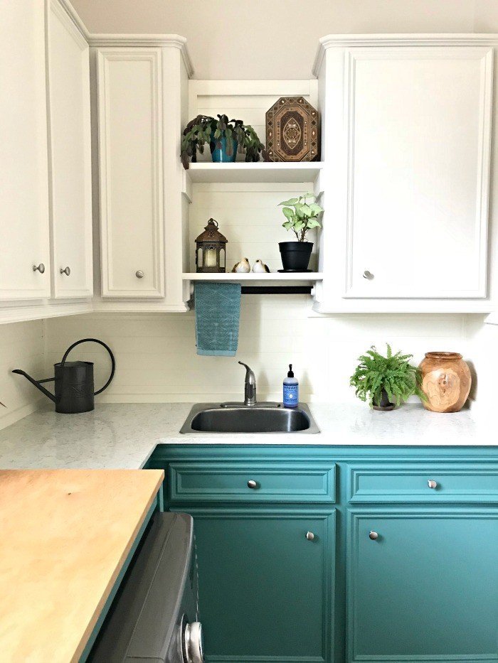 Our White and Teal Colorful Laundry Room Makeover is done! You won't believe the Laundry Room Before and After photos. This Colorful Modern Farmhouse Laundry Room makeover uses teal, wood, and lots of white to freshen and lighten the whole space. #LaundryRoom #ModernFarmhouse #Teal #AbbottsAtHome