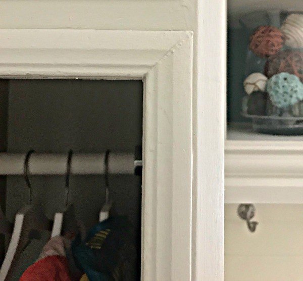 You'll love this DIY Tall Cabinet Makeover into Coat and Shoe Storage. Convert any cabinets into pretty open cabinet storage with these tips and steps that'll make sure your open cabinets look like custom built-ins. #AbbottsAtHome #OpenCabinets #OpenShelves #MudroomIdeas #CabinetMakeover