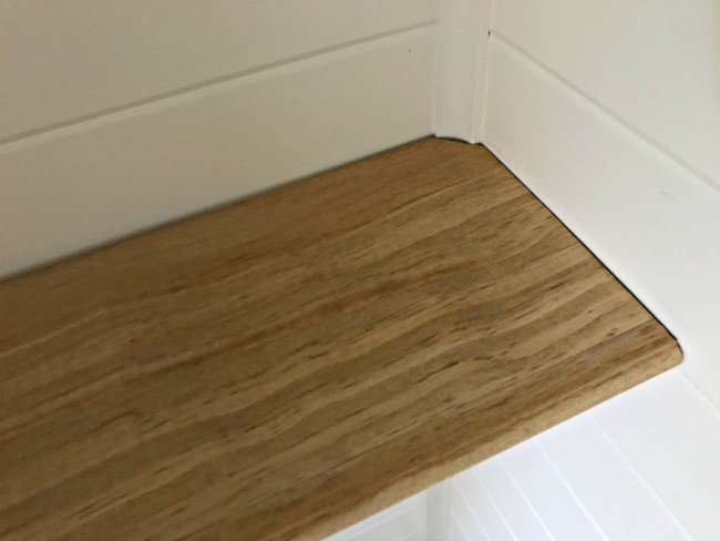 Build this Quick and Easy DIY Bathroom Shelf over your Toilet for extra storage or a little Modern Farmhouse Style. No Special Hardware Required. #AbbottsAtHome #DIYShelf #EasyDIYProject #ModernFarmhouse