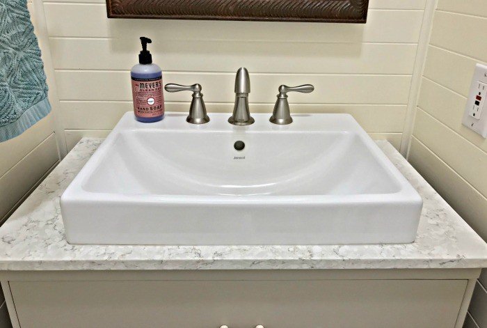 If you're wondering how to convert that dresser into a vanity, I've got some tips for converting a dresser into a vanity. And how-to steps to cut and modify the vanity drawers for plumbing. #AbbottsAtHome #DIYVanity #BathroomVanity #BathroomIdeas