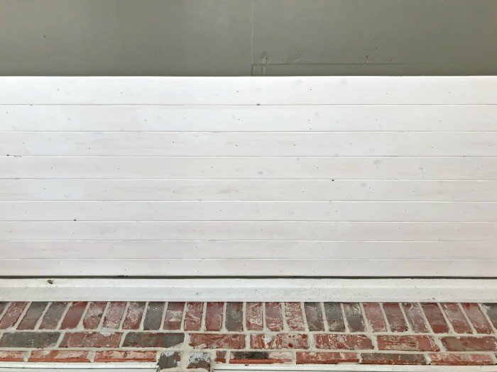 A DIY Pine Tongue and Groove Ceiling Tutorial that will turn your porch into that beautiful, charming spot you've always wanted. For most porches, you can have these wood planks installed in a weekend, guys! #AbbottsAtHome #PlankCeiling #PorchCeiling #TongueAndGroove