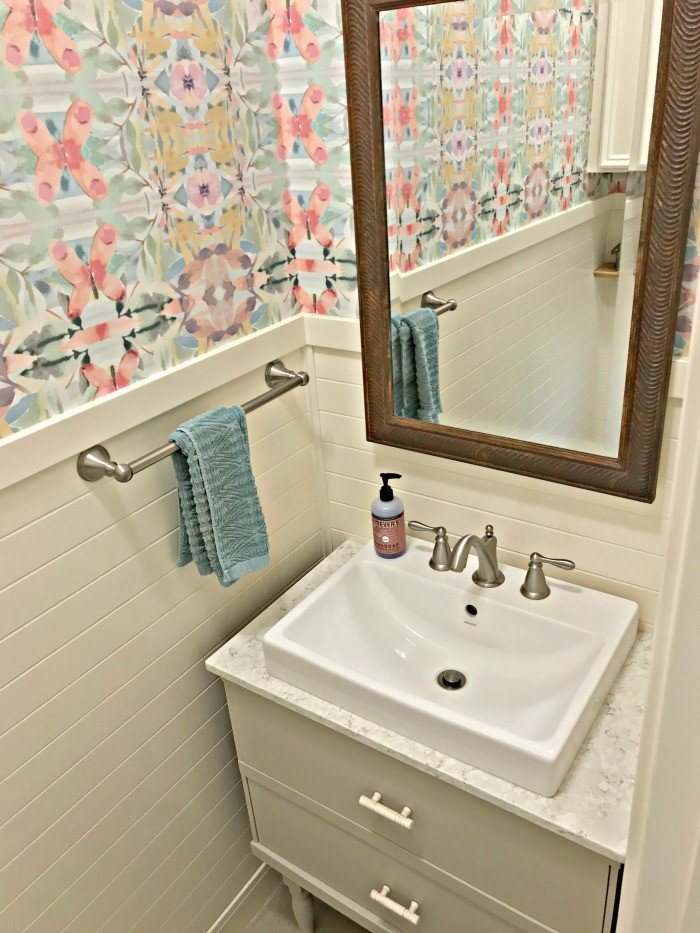 You'll love these Small Colorful Modern Farmhouse Powder Room Ideas! Most of these updates were DIY projects you can do at home. This was my first time hanging wallpaper and I was able to get it done in 1 day! #Wallpaper #AbbottsAtHome #PowderRoom #BathroomIdeas #ModernFarmhouse