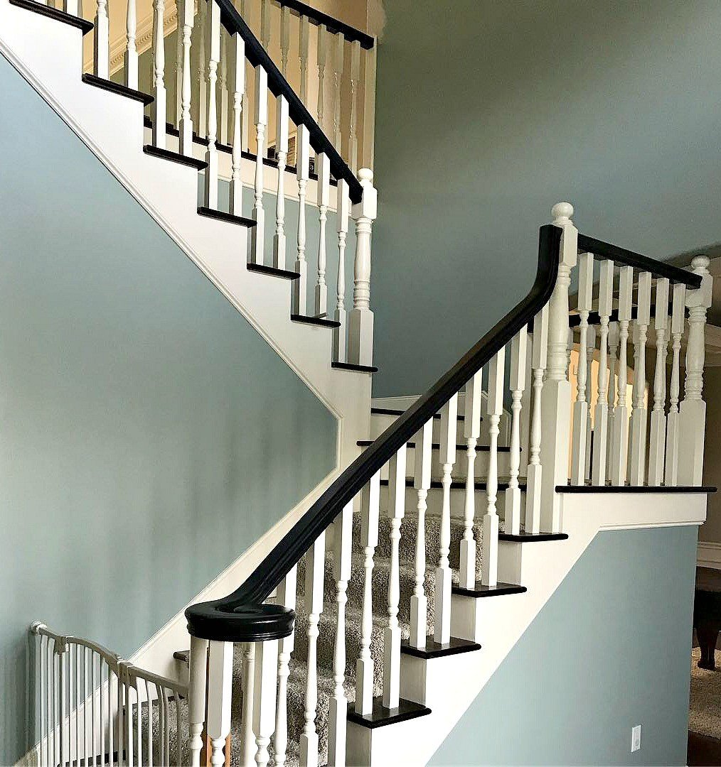 How a light colored paint scheme has transformed this home and even made the crown molding and millwork pop! #AbbottsAtHome #LightWalls #WhiteWalls #GreyWalls #PaintIdeas