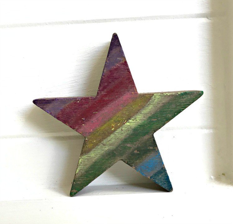 Crayon Ornament. Need some new ideas for this years Christmas craft? I've got 12 fun and easy handmade Christmas Ornament Ideas for you! Make 3D scrapbook paper trees, pom pom trees, star string art, unicorn stars, and more. #AbbottsAtHome #Handmade #ChristmasCrafts #ChristmasIdeas #ChristmasOrnaments