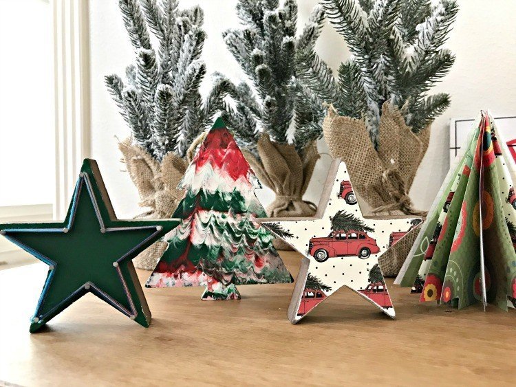 Need some new ideas for this years Christmas craft? I've got 12 fun and easy handmade Christmas Ornament Ideas for you! Make 3D scrapbook paper trees, pom pom trees, star string art, unicorn stars, and more. #AbbottsAtHome #Handmade #ChristmasCrafts #ChristmasIdeas #ChristmasOrnaments