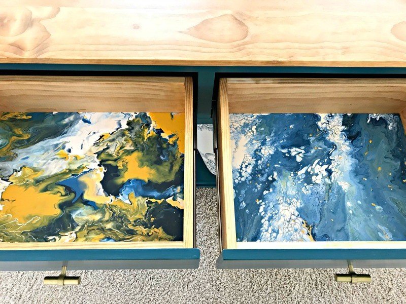 This Fun & Easy DIY Acrylic Pour Tutorial is a great way to make unique and low cost art. But, how about using that acrylic pour on drawers and furniture?! #AbbottsAtHome #AcrylicPaint #DIYHomeDecor #AcrylicPouring