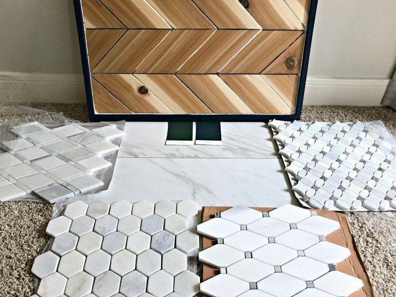 Yay! It's finally happening. I'm giving our Master Bathroom a much needed makeover. Here's the ORC Master Bath Makeover plan full of beautiful marble tile, chrome fixtures, pretty wood decor, and pops of blue. #AbbottsAtHome #BathroomDesign #MarbleTile #MasterBathroom #BathroomIdeas