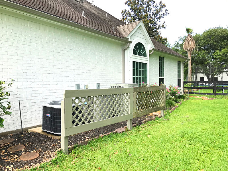 Image of DIY removable fence panels for air conditioners.