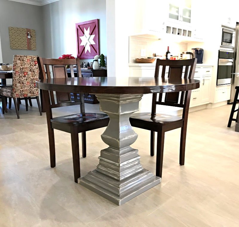 How to build a DIY Wooden Kitchen Table with a pedestal base - using an Osborne Wood Transitional Pedestal as a starting point - then adding wood squares to build the pedestal up and trim moulding to finish it.
