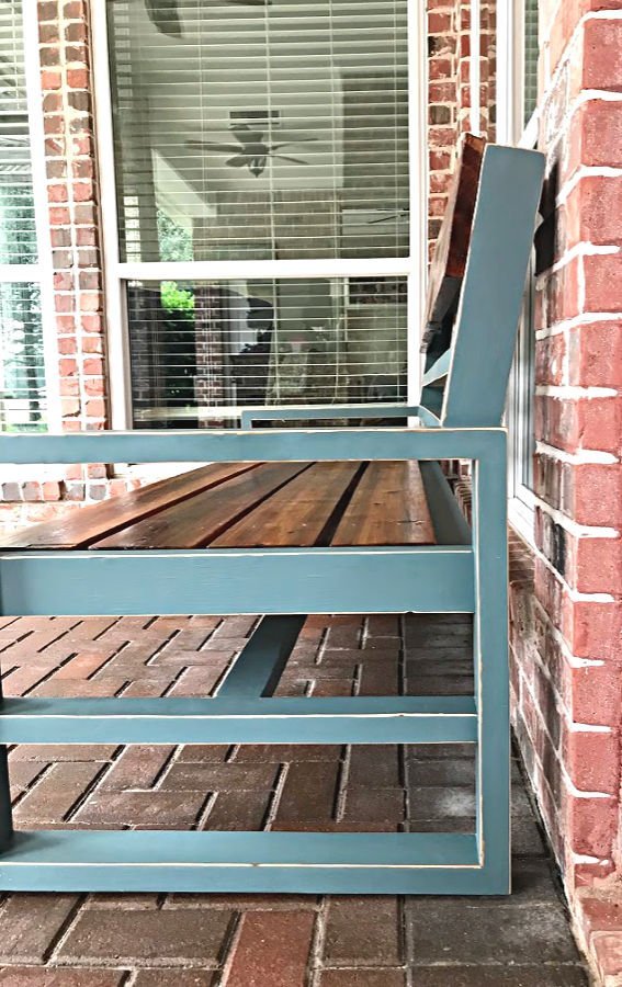 Easy to follow steps for this beautiful DIY Blue Distressed Paint using petroleum jelly (Vaseline) and Magnolia Homes by Kilz paint color Demo Day. Paint an Outdoor Bench or any furniture with these steps.