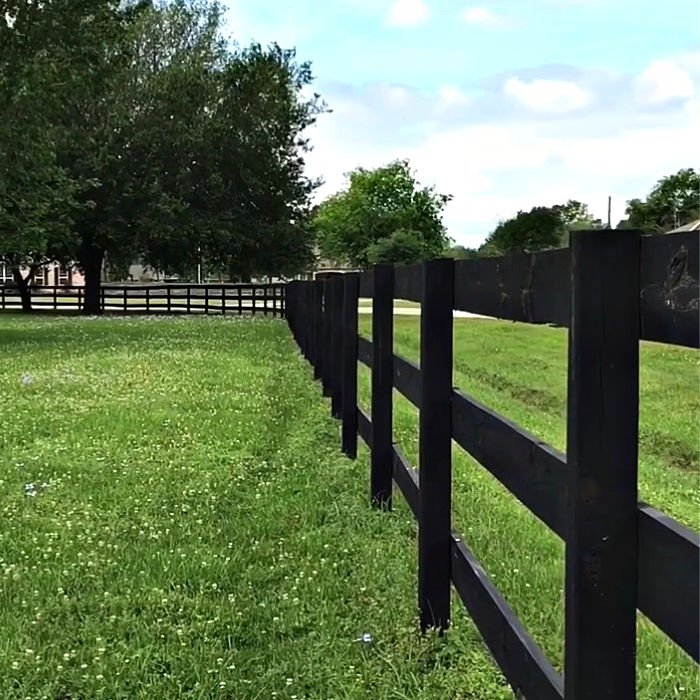 Here's how to set wooden fence posts in concrete - with written steps and a quick video to show you how to build or DIY your own Three Rail Fence or other horizontal fence ideas.