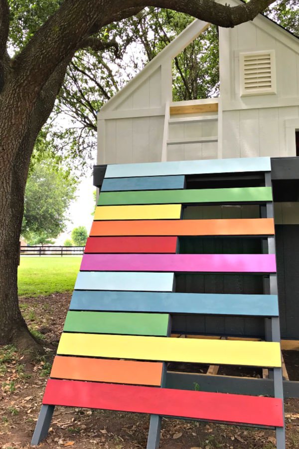 Easy to follow steps and video to make a kids climbing ramp, or rock climbing wall, for that backyard playhouse, fort, or play set. Fun design, right?! DIY Kids Rock Climbing Wall or Ramp.
