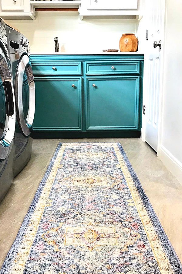 Here's How to Clean Area Rugs At Home, using a Bissell SpotClean Pro. Steps and tips for small stains and for rugs with all over dirt and stains.