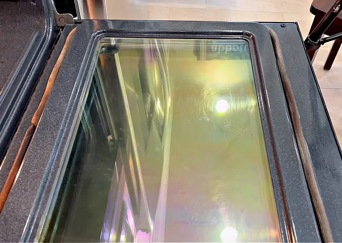 https://www.abbottsathome.com/wp-content/uploads/2022/07/Clean-Dirty-Oven-Glass-Easy-Off-2.jpg.webp
